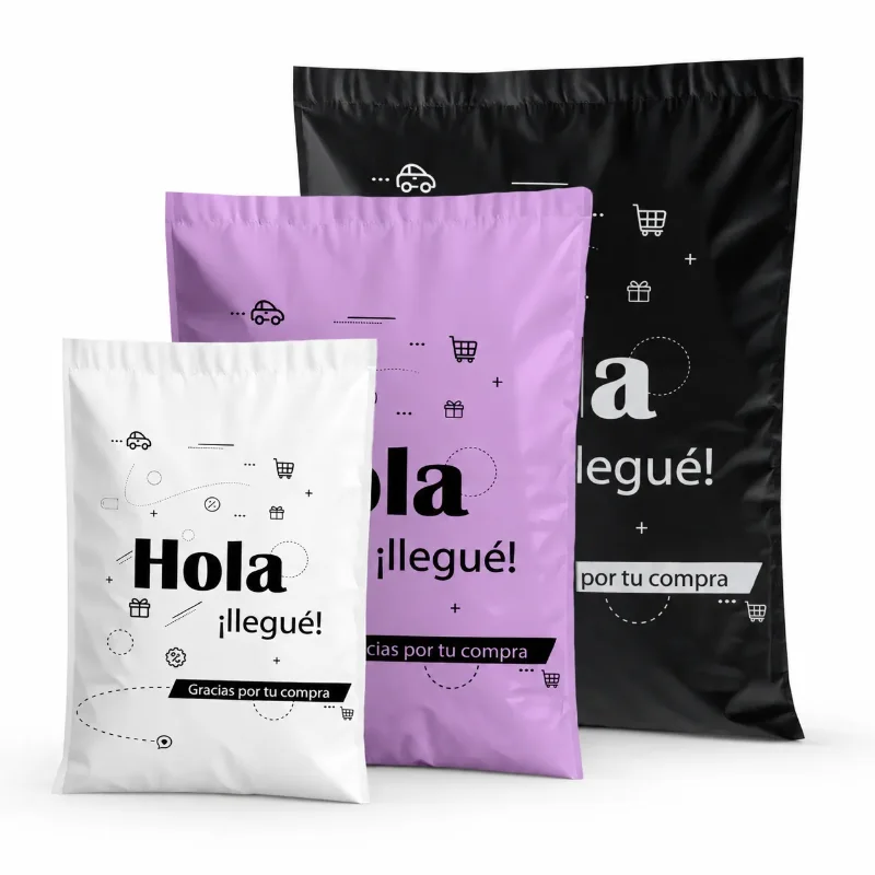 Tres bolsas e-commerce Hola ¡llegué! en blanco, lila y negro, con la leyenda «Gracias por tu compra»